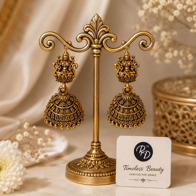 Jhumka (Earrings) - Traditional yet premium Lakshmi-inspired gold Jhumka